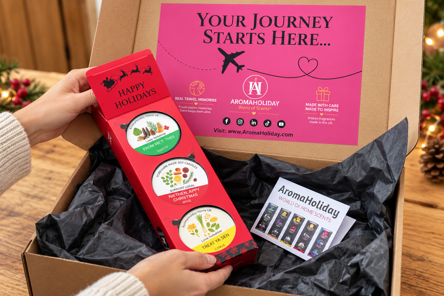Secret Yorkshire Christmas candle gift set being unboxed from luxury AromaHoliday gift packaging